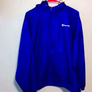 Champion Men's Blue Pullover Windbreaker Size large, has a front pocket